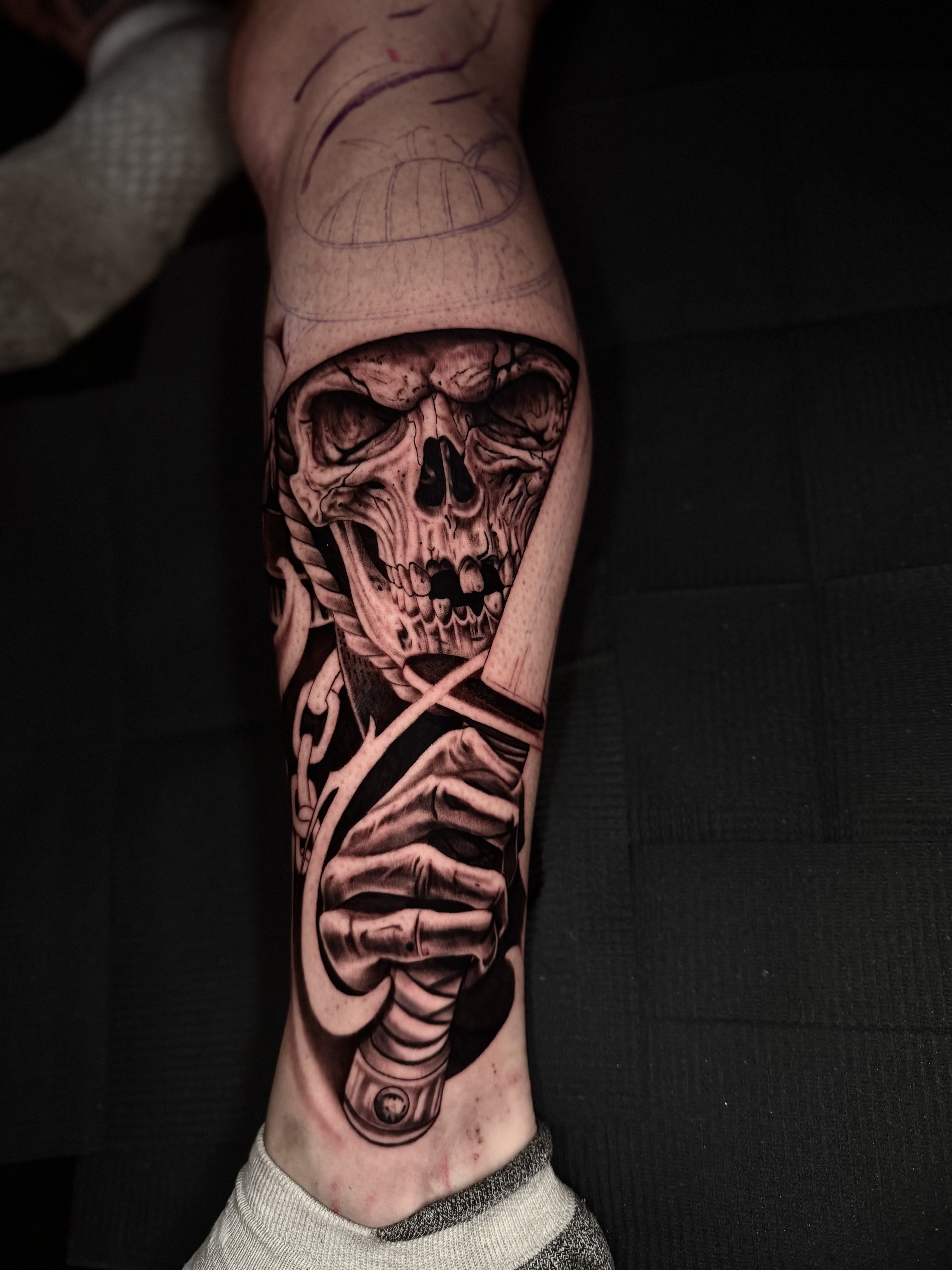 The Reaper — dark realism · forearm
